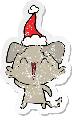 El sallayan küçük köpek eli bir insan tarafından çizilmiş Noel Baba şapkası giymiş bir çıkartma.