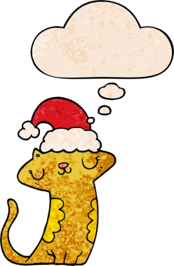 Şirin çizgi film kedisi Noel şapkası takıyor ve insan tarafından çizilmiş grunge desenli düşünce baloncuğu var.