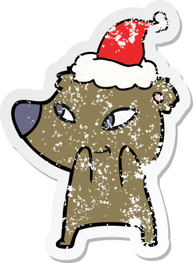 Bir insan tarafından çizilmiş Noel Baba şapkası takan bir ayının çizilmiş tatlı eli.