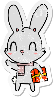 Bir insan tarafından çizilmiş Noel hediyeli şirin bir tavşanın sıkıntılı çıkartması.