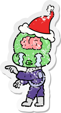 Ağlayan ve Noel Baba şapkası takan büyük beyinli bir uzaylının çizilmiş el yazısı.