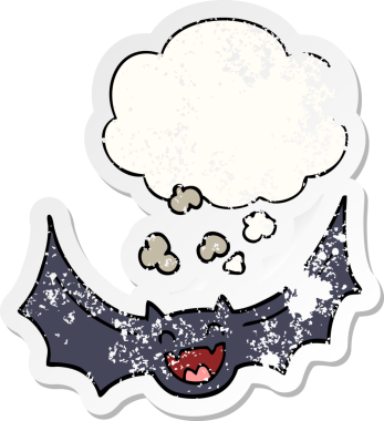 Düşünce baloncuklu karikatür yarasası bir insan tarafından çizilmiş yıpranmış bir çıkartma.