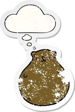 Düşünce baloncuğu olan çizgi film ayısı bir insan tarafından çizilmiş yıpranmış bir çıkartma.