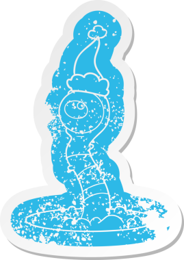 Bir insan tarafından çizilmiş Noel Baba şapkası giyen uzaylı bir bataklık canavarının garip bir karikatürü.