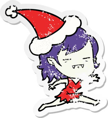 Bir insan tarafından çizilmiş Noel Baba şapkası giyen ölümsüz bir vampirin çizilmiş el yazısı.