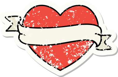 Bir insan tarafından çizilmiş geleneksel bir kalp ve bayrak stili dövmesi.