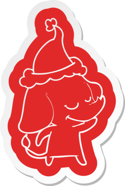 Bir insan tarafından çizilmiş Noel Baba şapkası takan gülümseyen bir filin garip çizgi film çıkartması.