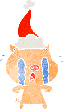 Ağlayan domuz eli bir insan tarafından çizilmiş Noel Baba şapkası çizilmiş.