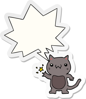 Bir insan tarafından çizilmiş konuşma kabarcığı çıkartması ile tırmalayan çizgi film kedisi.