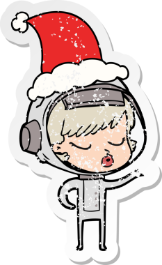 Bir insan tarafından çizilmiş Noel Baba şapkası giymiş güzel bir astronot kızın el çizimi karikatürü.