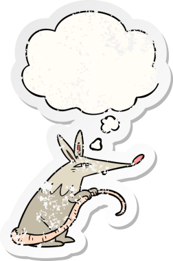 Düşünce baloncuğu olan çizgi film faresi insan tarafından çizilmiş yıpranmış bir çıkartma.