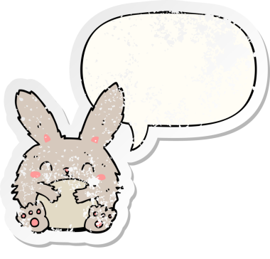 Konuşma baloncuğu olan sevimli çizgi film tavşanı bir insan tarafından çizilmiş sıkıntılı eski bir çıkartma