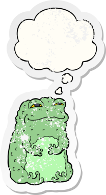 Düşünce baloncuğu olan kendini beğenmiş çizgi film karakurbağası bir insan tarafından çizilmiş yıpranmış bir çıkartma.