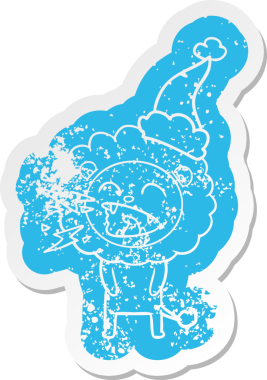 Bir insan tarafından çizilmiş Noel Baba şapkası takan kükreyen bir aslan çıkartması.