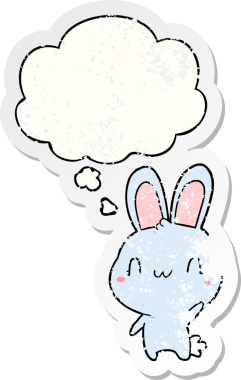 Düşünce baloncuğuyla sallanan çizgi film tavşanı insan tarafından çizilmiş yıpranmış bir çıkartma gibi.