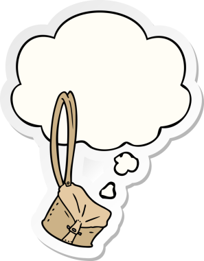 Düşünce baloncuklu eski bir sırt çantası çizgi filmi. Bir insan tarafından çizilmiş bir çıkartma.