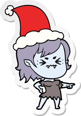 Bir insan tarafından çizilmiş Noel Baba şapkası takan vampir bir kızın çizilmiş el yazısı.