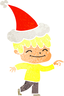 Bir insan tarafından çizilmiş Noel Baba şapkası giyen mutlu bir çocuğun el çizimi karikatürü.