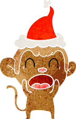 Bir insan tarafından çizilmiş Noel Baba şapkası giymiş bir maymunun el çizimi karikatürü.