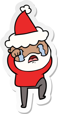 Bir insan tarafından çizilmiş Noel Baba şapkası giyen ve ağlayan sakallı bir adamın el yazısı.
