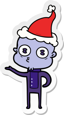 Bir insan tarafından çizilmiş Noel Baba şapkası giyen kel bir uzaylının el yazısı.