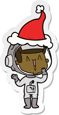 Bir insan tarafından çizilmiş Noel Baba şapkası giyen bir astronotun çizdiği el yazısı.