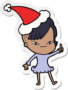 Hipster saç kesimi olan, Noel Baba şapkası takan bir kızın insan tarafından çizilmiş bir el yazısı.