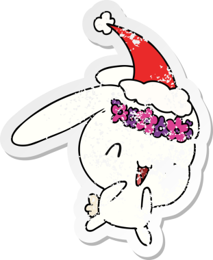 Bir insan tarafından çizilmiş Kamwai Tavşanı 'nın kederli Noel çıkartması.