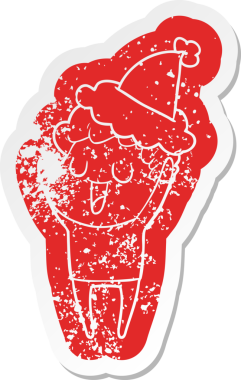 Gülen karikatür. Noel Baba şapkası takan bir adamın insan tarafından çizilmiş çıkartması.