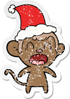 Bir insan tarafından çizilmiş Noel Baba şapkası giymiş bir maymunun gergin el yazısı.