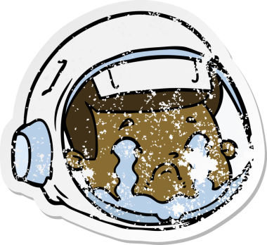 Karikatür astronotunun üzgün yüzü bir insan tarafından çizilmiş.