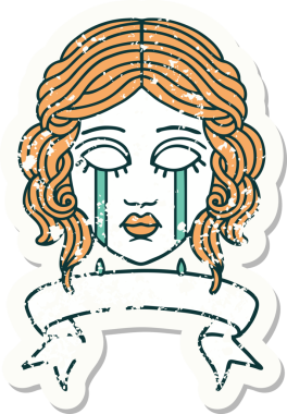 Bir insan tarafından çizilmiş kadın yüzü dövmeli eski bir etiket.