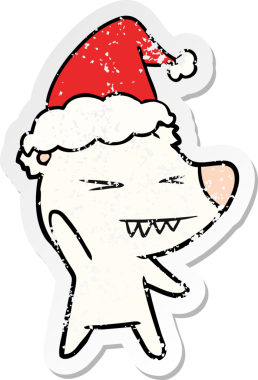 Kızgın kutup ayısı eli, bir insan tarafından çizilmiş Noel Baba şapkasının üzgün çıkartması çizilmiş.