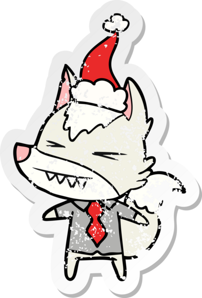 Kızgın kurt patronun eli, bir insan tarafından çizilmiş Noel Baba şapkasının üzgün çıkartması çizilmiş.