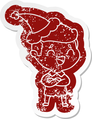 Bir insan tarafından çizilmiş Noel Baba şapkası takan bir adamın garip karikatürü.