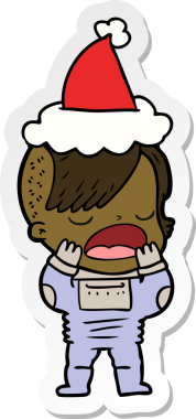 Uzay giysili havalı bir hippi kızın insan tarafından çizilmiş Noel Baba şapkası giydiği el yazısı.