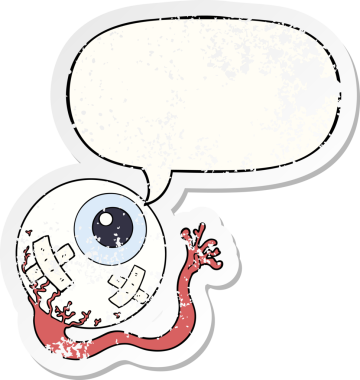 Çizgi filmdeki yaralı göz baloncuğu, bir insan tarafından çizilmiş sıkıntılı eski bir çıkartma.