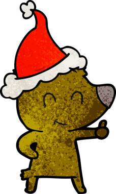 Bir insan tarafından çizilmiş Noel Baba şapkası giymiş kadın ayı eli.