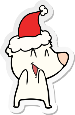 Gülen kutup ayısı eli bir insanın çizdiği Noel Baba şapkasının çıkartmasını çizmiş.