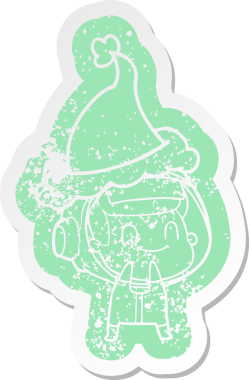 Mutlu çizgi film, bir insan tarafından çizilmiş Noel Baba şapkası giyen bir astronotun sıkıntılı çıkartması.