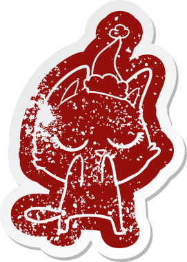 Sakin çizgi film Noel Baba şapkası takan bir kedinin insan tarafından çizilmiş sıkıntılı çıkartması.