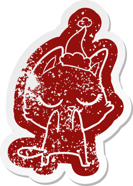 Sakin çizgi film Noel Baba şapkası takan bir kedinin insan tarafından çizilmiş sıkıntılı çıkartması.