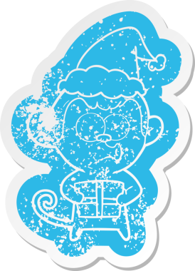 Bir insan tarafından çizilmiş Noel Baba şapkası giyen bir maymunun garip karikatür çıkartması.