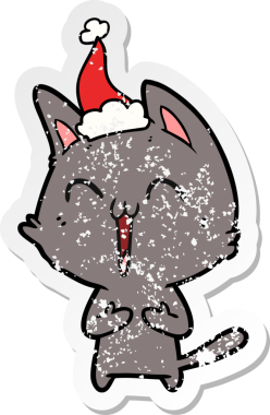 Mutlu el çizilmiş hüzünlü bir karikatür. Bir insan tarafından çizilmiş Noel Baba şapkası takan bir kedi.