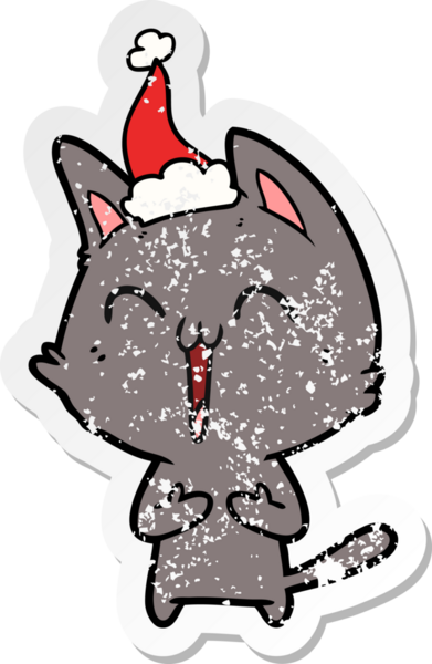 Mutlu el çizilmiş hüzünlü bir karikatür. Bir insan tarafından çizilmiş Noel Baba şapkası takan bir kedi.