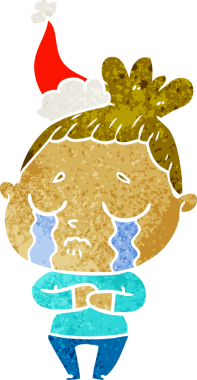 Bir insan tarafından çizilmiş Noel Baba şapkası takan ağlayan bir kadının el çizimi karikatürü.