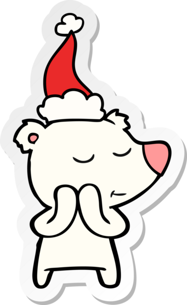 Bir insan tarafından çizilmiş Noel Baba şapkası giyen bir kutup ayısının mutlu el çizimi karikatürü.