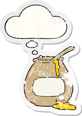 Düşünce baloncuğu olan çizgi film bal küpü insan tarafından çizilmiş yıpranmış bir çıkartma gibi.