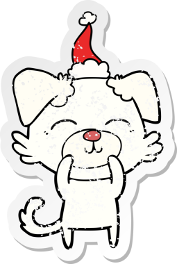 Bir insan tarafından çizilmiş Noel Baba şapkası takan bir köpeğin el yazısı.