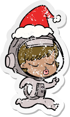 Bir insan tarafından çizilmiş Noel Baba şapkasıyla koşan güzel bir astronot kızın çizilmiş el yazısı.